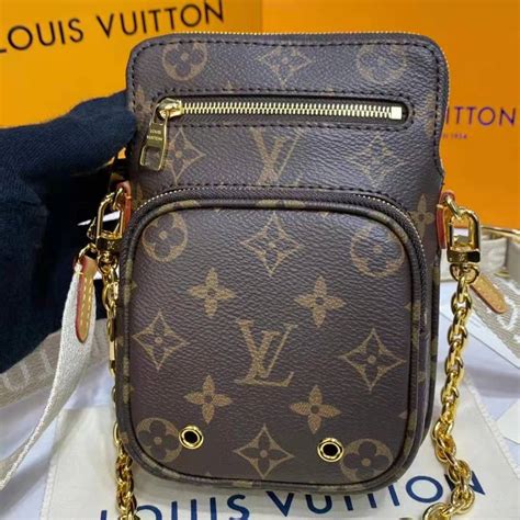 Louis Vuitton Utility Phone Sleeve Monogram .